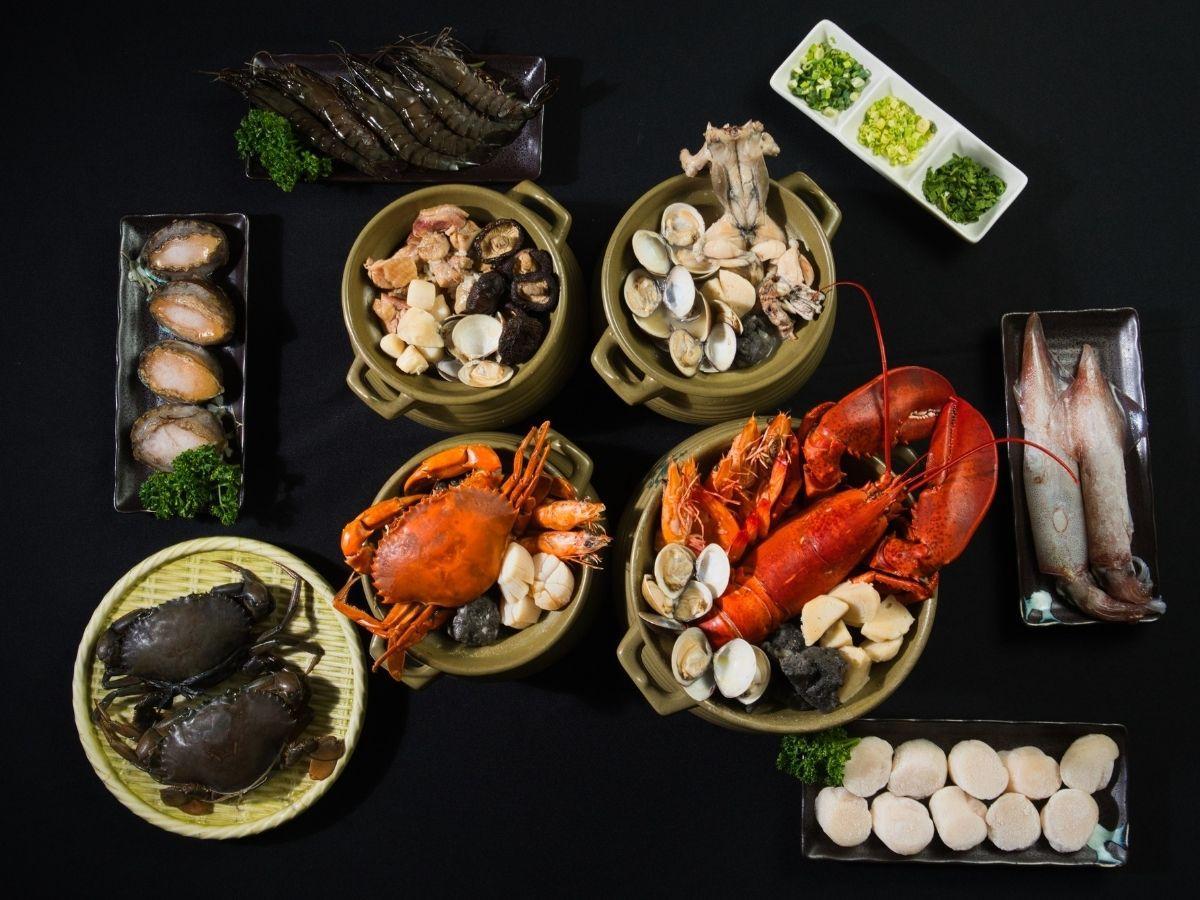 嘉義西區海鮮餐廳 生米慢熬活體紅蟳砂鍋粥 百元起享受濃鮮海味